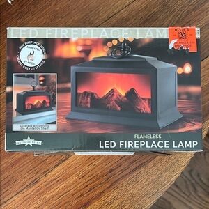 Never used. Meridian Point Flameless LED Fireplace Lamp
